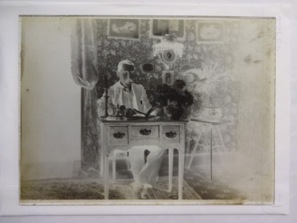 Dr Baker at a desk