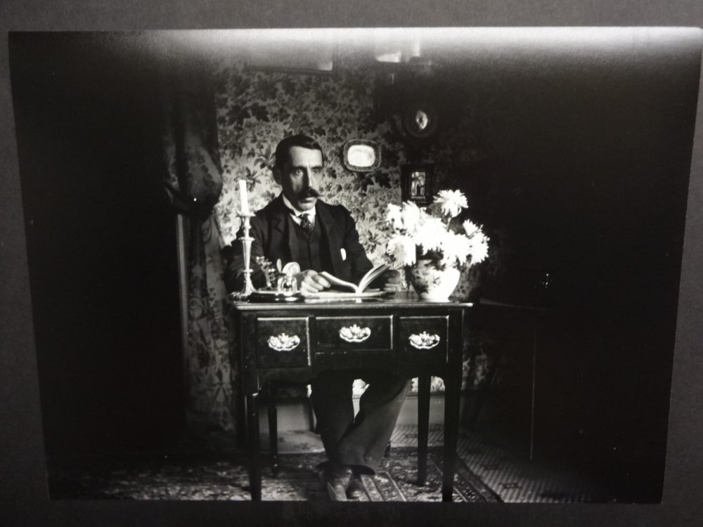 Dr Baker at a desk