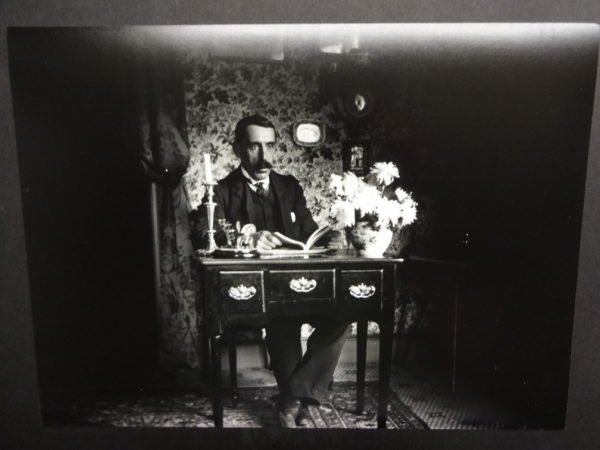 Dr Baker at a desk
