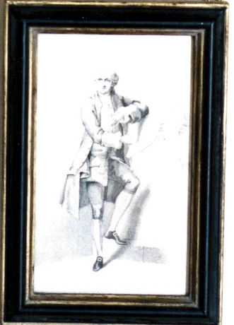 Garrick standing before a bust of Shakespeare