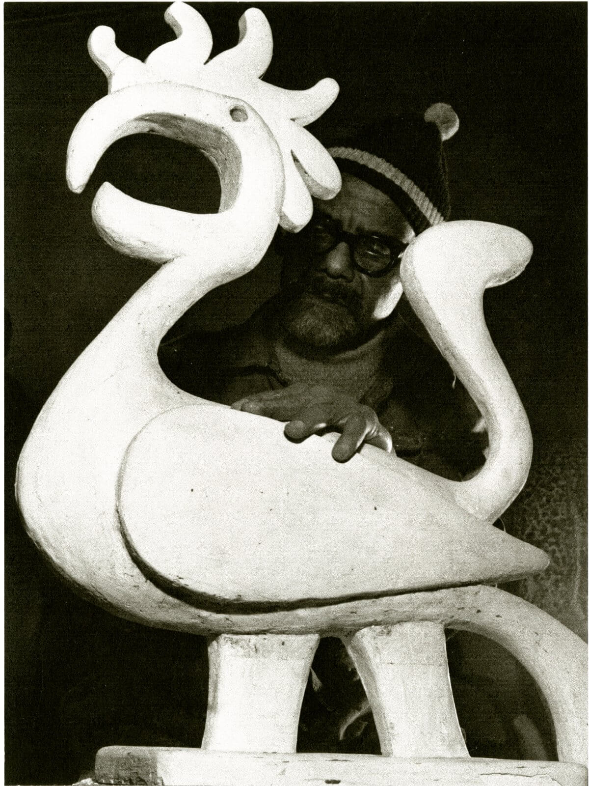 <p>Ronald Moody working on plaster model of 'Savacou Maquette', Fleming Close Studio Fulham 1963</p>